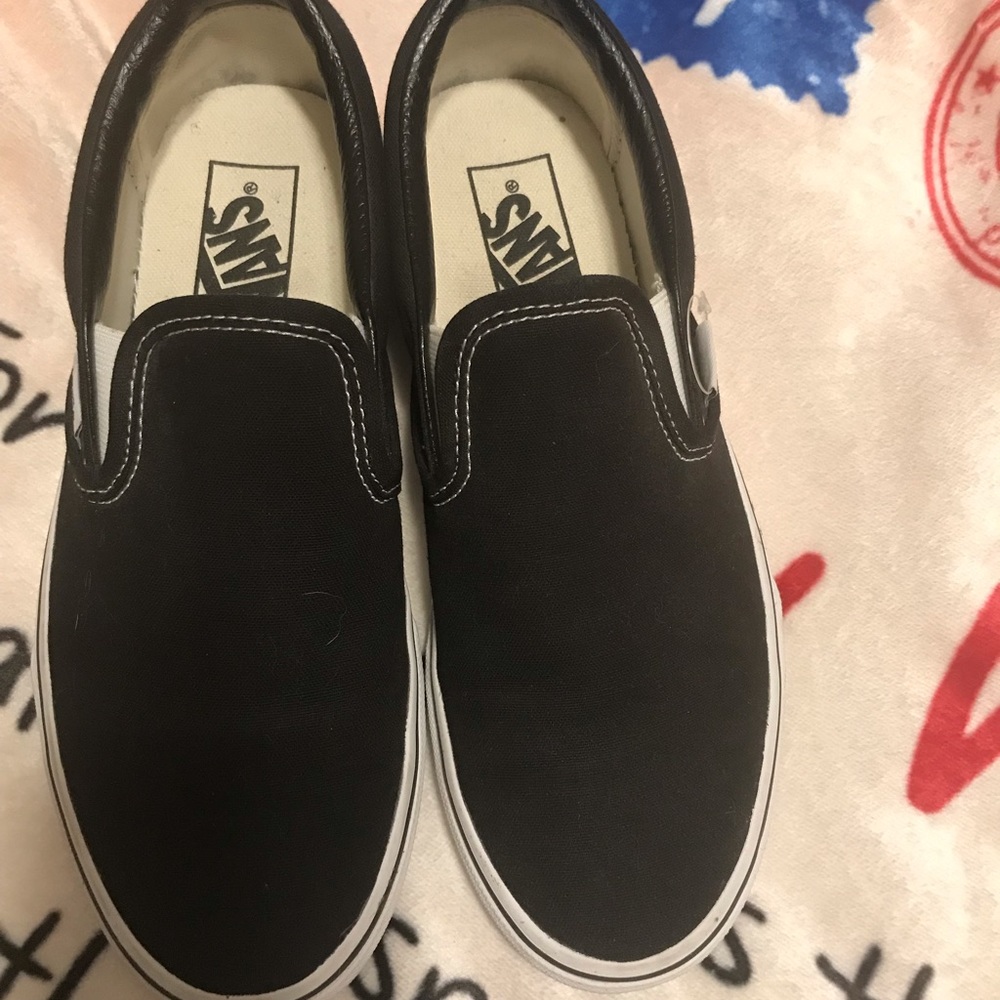 Vans classic black and white slip on sneaker